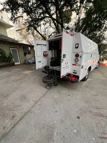 Magnet Plumbing service vehicle on-site for Grease Trap Cleaning in Kalifornsky
